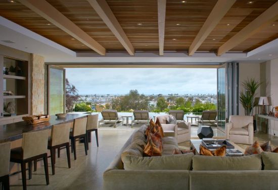 The media room with a full wet bar. (Photo by Toby Ponnay)